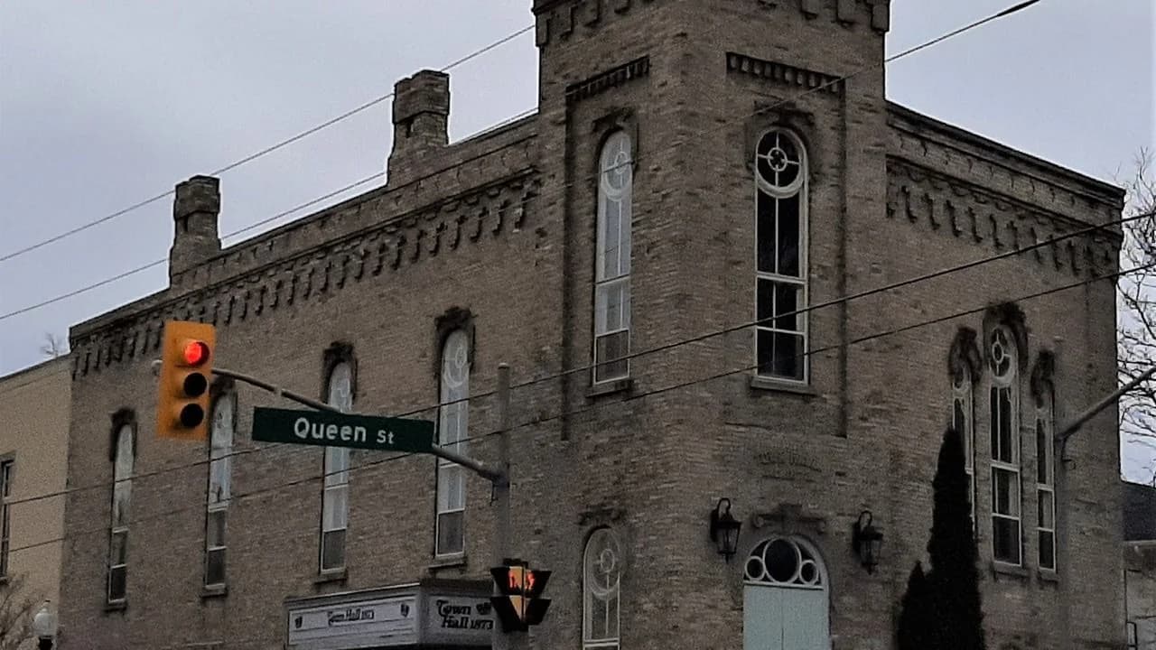 The former Port Perry town hall, a historic brick building at Queen Street in Port Perry; no people visible.